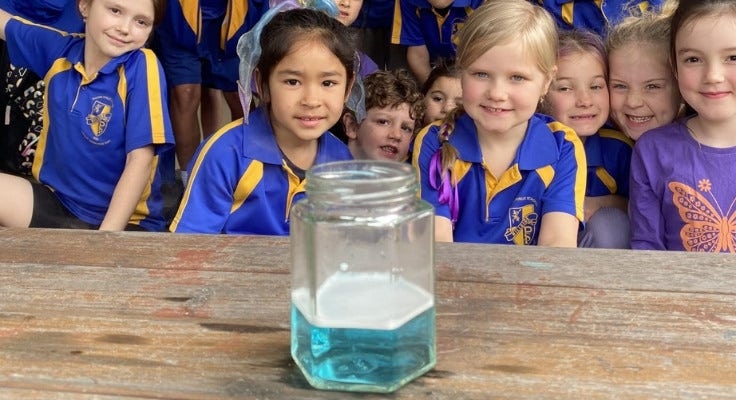 Hillside students watching science experiment