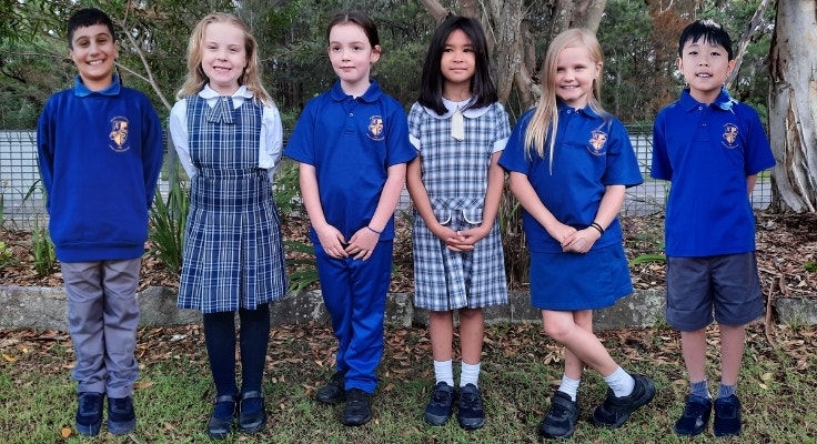 Hillside students wearing winter and summer school uniforms