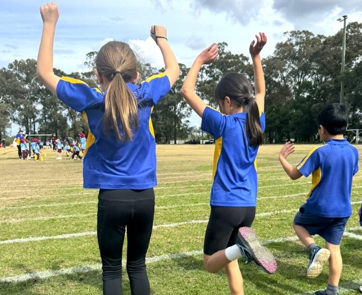 Hillside students cheering other students during the athletics carnival