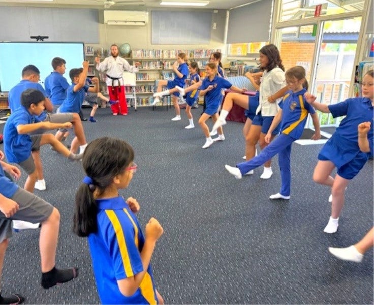 Hillside students participating in karate lessons