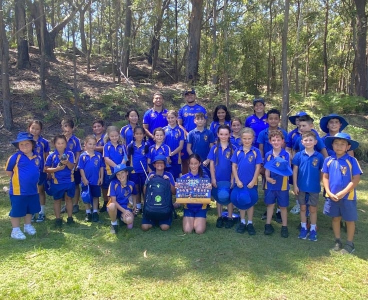 Hillside students smiling with NRL Parramatta players